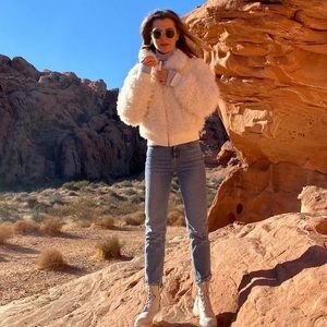 White fuzzy bomber . Worn once . Aeropostale